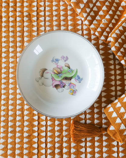 Assiette en porcelaine de Limoges motif enfantin