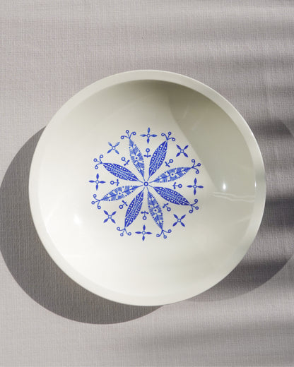 Assiette creuse au motif floral et géométrique de la marque Gien