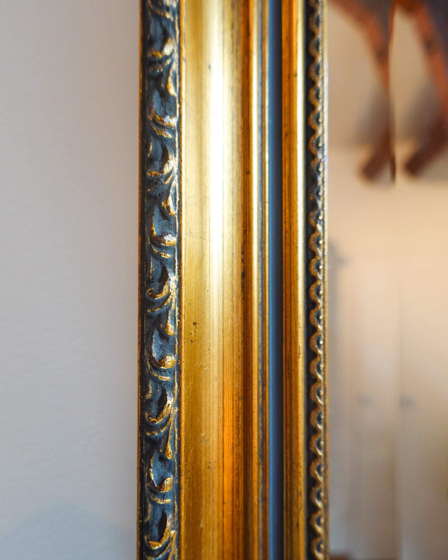 Miroir mural octogonal doré, cadre mouluré